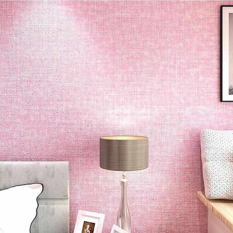 giấy dán tường màu hồng vân xước